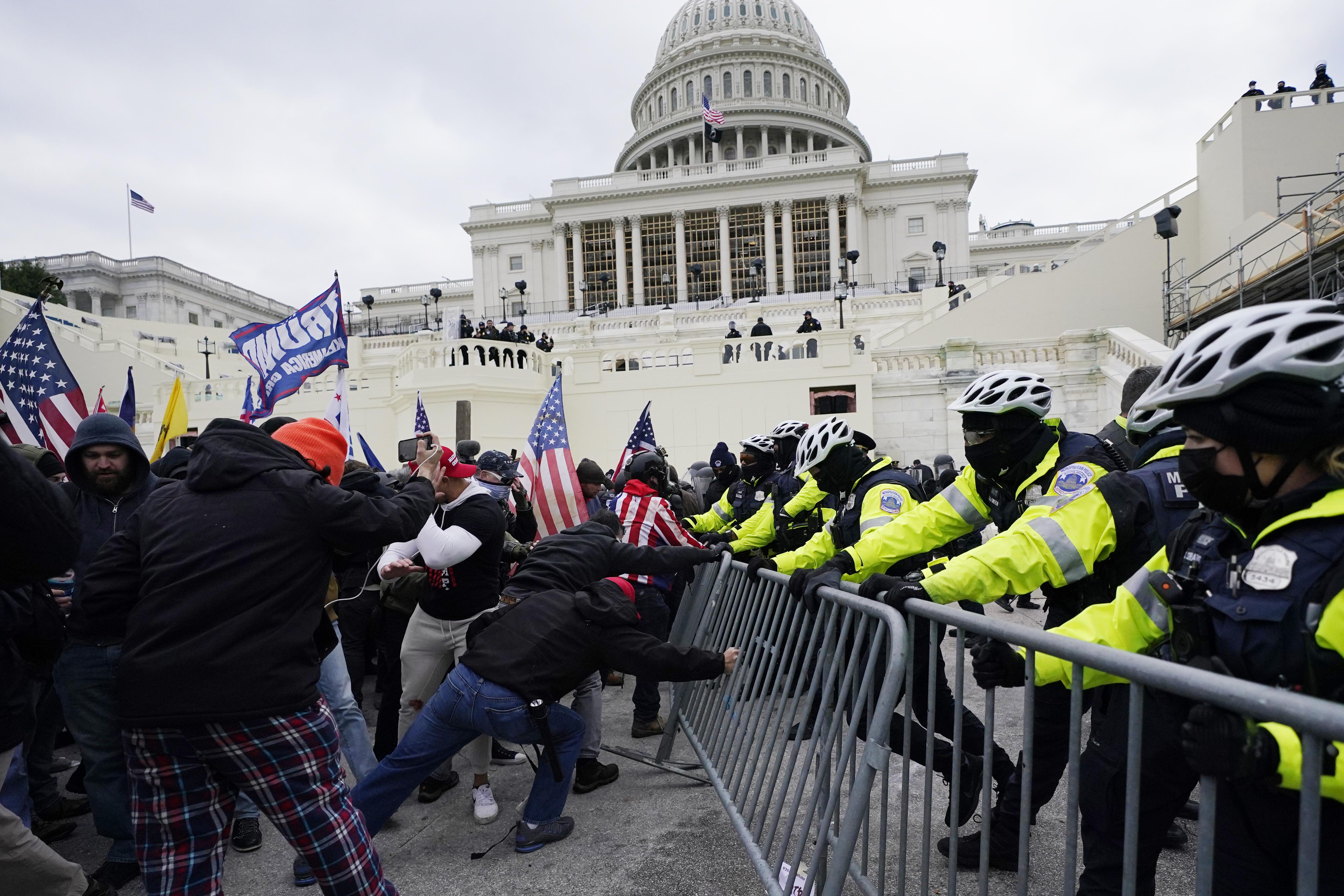 One man was a Capitol Police officer. The other rioted on Jan. 6 ...